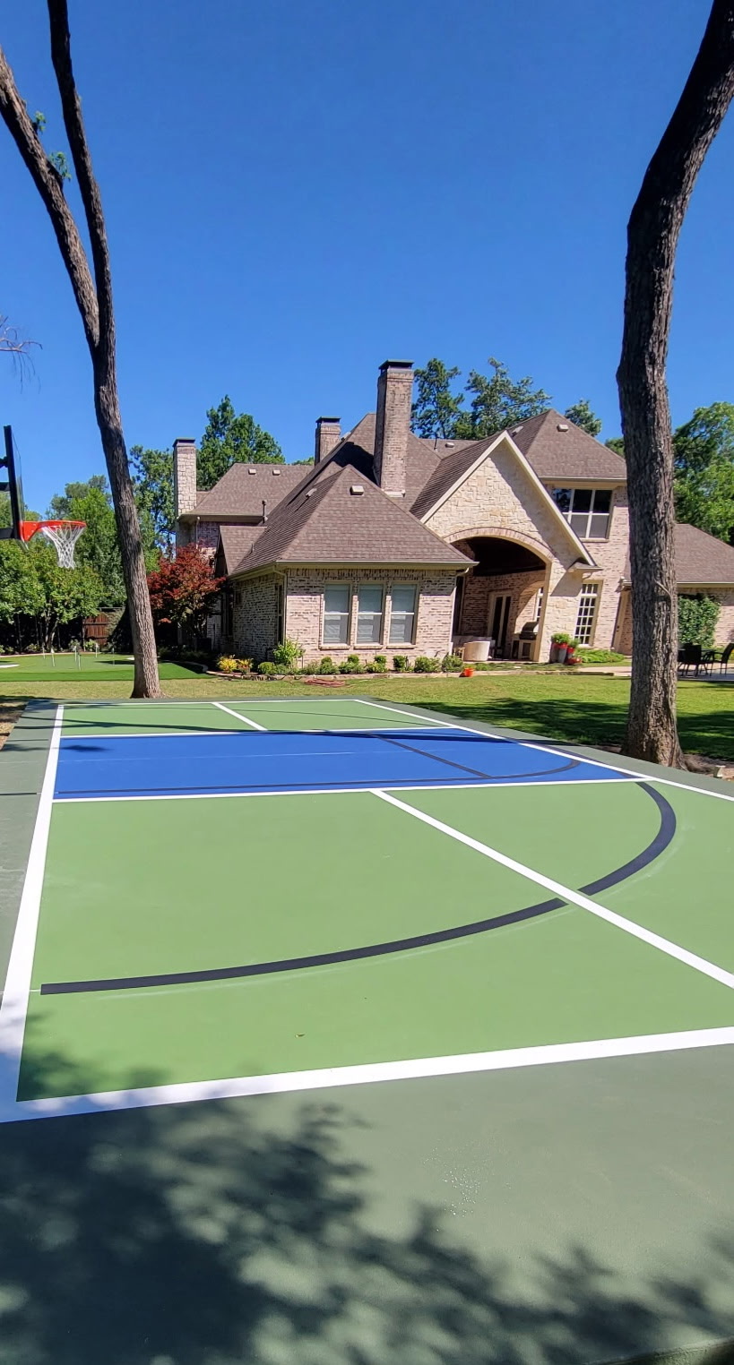 Finished blue and red basketball and pickleball multi-sport court
