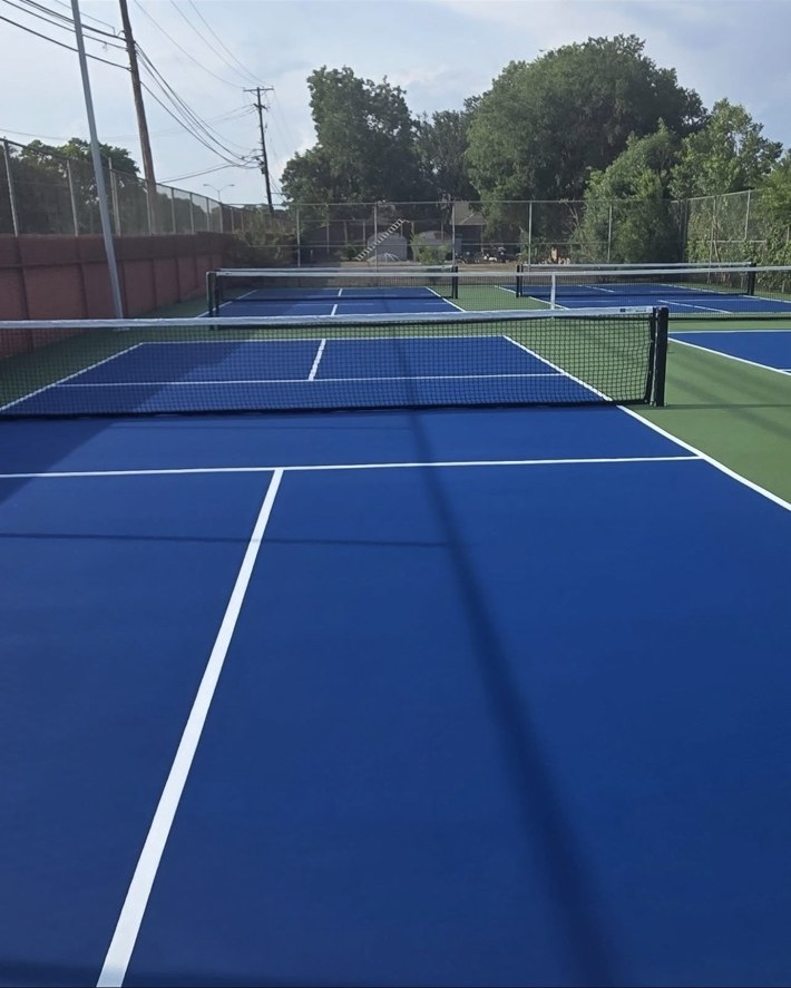 Finished blue pickleball courts after conversion in Plano Texas